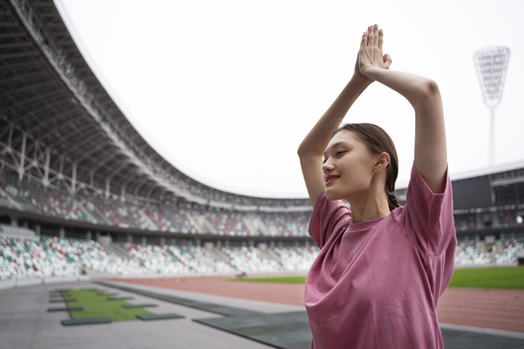 side view woman doing yoga